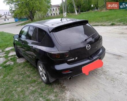 Чорний Мазда 3, об'ємом двигуна 2 л та пробігом 200 тис. км за 4700 $, фото 4 на Automoto.ua