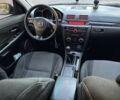 Чорний Мазда 3, об'ємом двигуна 1.6 л та пробігом 170 тис. км за 4112 $, фото 4 на Automoto.ua