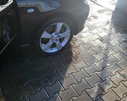 Черный Мазда 3, объемом двигателя 2 л и пробегом 193 тыс. км за 6000 $, фото 1 на Automoto.ua