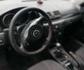Черный Мазда 3, объемом двигателя 1.6 л и пробегом 223 тыс. км за 4000 $, фото 14 на Automoto.ua