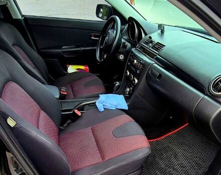 Черный Мазда 3, объемом двигателя 1.6 л и пробегом 357 тыс. км за 5200 $, фото 2 на Automoto.ua