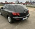Черный Мазда 3, объемом двигателя 1.3 л и пробегом 190 тыс. км за 3200 $, фото 2 на Automoto.ua