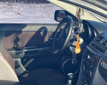 Чорний Мазда 3, об'ємом двигуна 2 л та пробігом 372 тис. км за 3900 $, фото 6 на Automoto.ua