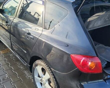 Черный Мазда 3, объемом двигателя 2 л и пробегом 193 тыс. км за 6000 $, фото 9 на Automoto.ua