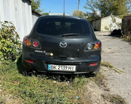 Черный Мазда 3, объемом двигателя 1.6 л и пробегом 273 тыс. км за 1500 $, фото 1 на Automoto.ua