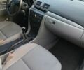 Черный Мазда 3, объемом двигателя 1.35 л и пробегом 285 тыс. км за 4500 $, фото 8 на Automoto.ua