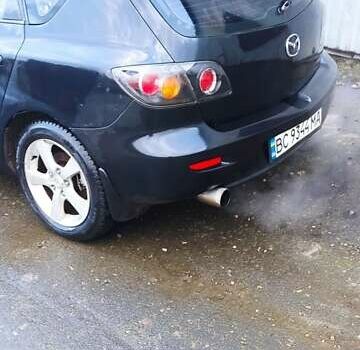 Черный Мазда 3, объемом двигателя 1.6 л и пробегом 260 тыс. км за 2800 $, фото 1 на Automoto.ua