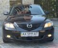 Черный Мазда 3, объемом двигателя 1.6 л и пробегом 158 тыс. км за 5750 $, фото 2 на Automoto.ua