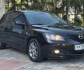 Черный Мазда 3, объемом двигателя 1.6 л и пробегом 158 тыс. км за 5750 $, фото 3 на Automoto.ua