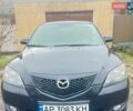 Черный Мазда 3, объемом двигателя 2 л и пробегом 245 тыс. км за 4650 $, фото 1 на Automoto.ua