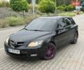 Черный Мазда 3, объемом двигателя 2 л и пробегом 264 тыс. км за 4300 $, фото 1 на Automoto.ua