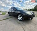Черный Мазда 3, объемом двигателя 1.6 л и пробегом 289 тыс. км за 3900 $, фото 1 на Automoto.ua