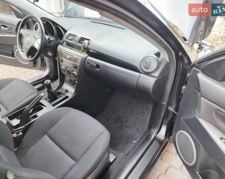 Черный Мазда 3, объемом двигателя 2 л и пробегом 110 тыс. км за 6500 $, фото 7 на Automoto.ua