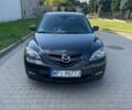 Черный Мазда 3, объемом двигателя 1.6 л и пробегом 200 тыс. км за 900 $, фото 1 на Automoto.ua