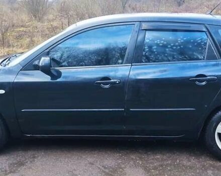 Черный Мазда 3, объемом двигателя 1.6 л и пробегом 260 тыс. км за 2800 $, фото 7 на Automoto.ua