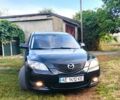 Чорний Мазда 3, об'ємом двигуна 1.6 л та пробігом 303 тис. км за 5000 $, фото 1 на Automoto.ua