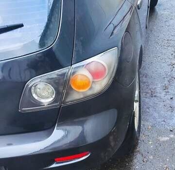 Черный Мазда 3, объемом двигателя 1.6 л и пробегом 260 тыс. км за 2800 $, фото 3 на Automoto.ua