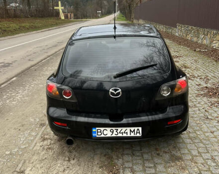 Черный Мазда 3, объемом двигателя 1.6 л и пробегом 260 тыс. км за 3250 $, фото 4 на Automoto.ua