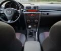 Чорний Мазда 3, об'ємом двигуна 1.6 л та пробігом 193 тис. км за 4999 $, фото 13 на Automoto.ua