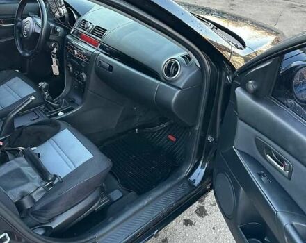 Черный Мазда 3, объемом двигателя 1.6 л и пробегом 199 тыс. км за 3700 $, фото 1 на Automoto.ua