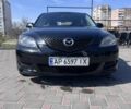 Черный Мазда 3, объемом двигателя 1.6 л и пробегом 330 тыс. км за 4200 $, фото 1 на Automoto.ua