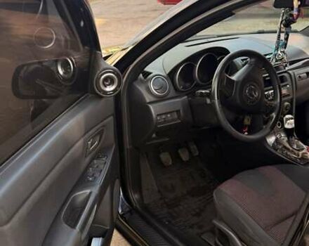 Черный Мазда 3, объемом двигателя 2 л и пробегом 338 тыс. км за 5500 $, фото 6 на Automoto.ua