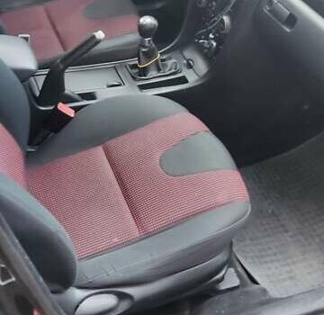 Черный Мазда 3, объемом двигателя 1.6 л и пробегом 260 тыс. км за 2800 $, фото 2 на Automoto.ua