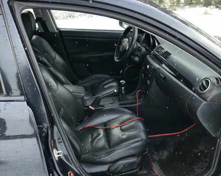 Черный Мазда 3, объемом двигателя 1.6 л и пробегом 296 тыс. км за 4499 $, фото 10 на Automoto.ua