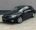 Черный Мазда 3, объемом двигателя 2.3 л и пробегом 220 тыс. км за 5990 $, фото 1 на Automoto.ua