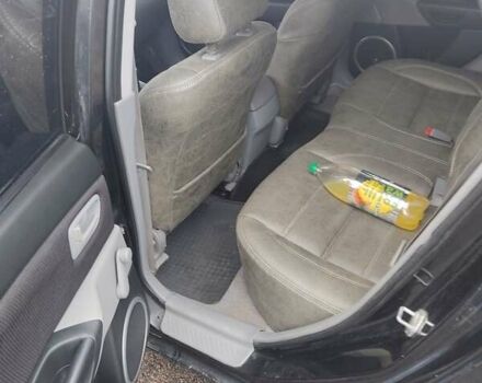 Черный Мазда 3, объемом двигателя 1.6 л и пробегом 285 тыс. км за 4000 $, фото 4 на Automoto.ua