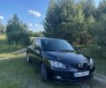 Черный Мазда 3, объемом двигателя 1.6 л и пробегом 223 тыс. км за 4700 $, фото 1 на Automoto.ua