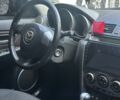 Черный Мазда 3, объемом двигателя 1.6 л и пробегом 240 тыс. км за 5200 $, фото 22 на Automoto.ua