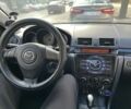 Черный Мазда 3, объемом двигателя 1.6 л и пробегом 170 тыс. км за 4299 $, фото 1 на Automoto.ua