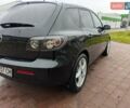 Чорний Мазда 3, об'ємом двигуна 1.6 л та пробігом 328 тис. км за 5200 $, фото 9 на Automoto.ua