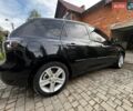 Чорний Мазда 3, об'ємом двигуна 2 л та пробігом 254 тис. км за 4500 $, фото 5 на Automoto.ua