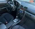 Чорний Мазда 3, об'ємом двигуна 1.6 л та пробігом 146 тис. км за 6950 $, фото 14 на Automoto.ua