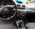 Чорний Мазда 3, об'ємом двигуна 2 л та пробігом 140 тис. км за 7000 $, фото 7 на Automoto.ua