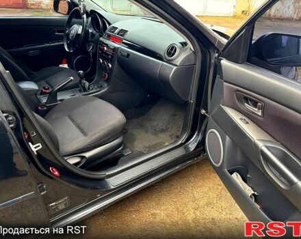 Черный Мазда 3, объемом двигателя 1.6 л и пробегом 333 тыс. км за 4600 $, фото 9 на Automoto.ua