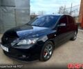 Черный Мазда 3, объемом двигателя 1.6 л и пробегом 333 тыс. км за 4600 $, фото 1 на Automoto.ua