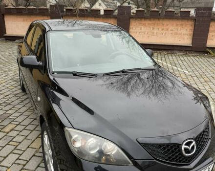 Черный Мазда 3, объемом двигателя 1.6 л и пробегом 217 тыс. км за 5800 $, фото 1 на Automoto.ua