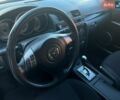 Чорний Мазда 3, об'ємом двигуна 1.6 л та пробігом 146 тис. км за 6950 $, фото 12 на Automoto.ua