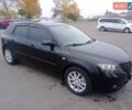 Черный Мазда 3, объемом двигателя 1.6 л и пробегом 165 тыс. км за 6100 $, фото 3 на Automoto.ua