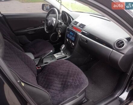 Черный Мазда 3, объемом двигателя 1.6 л и пробегом 165 тыс. км за 6100 $, фото 11 на Automoto.ua