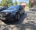 Черный Мазда 3, объемом двигателя 1.6 л и пробегом 199 тыс. км за 5700 $, фото 1 на Automoto.ua