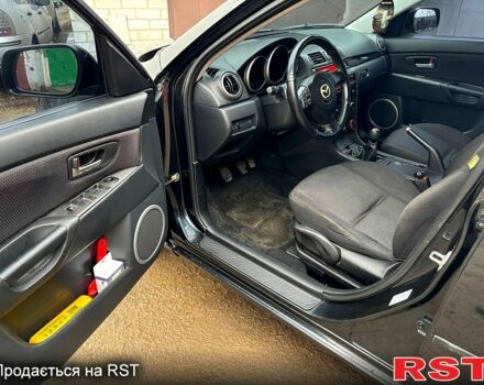 Черный Мазда 3, объемом двигателя 1.6 л и пробегом 333 тыс. км за 4600 $, фото 8 на Automoto.ua