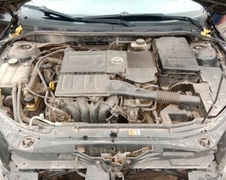 Черный Мазда 3, объемом двигателя 1.6 л и пробегом 246 тыс. км за 5500 $, фото 21 на Automoto.ua