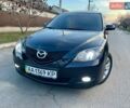 Черный Мазда 3, объемом двигателя 1.6 л и пробегом 170 тыс. км за 6950 $, фото 1 на Automoto.ua