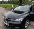 Чорний Мазда 3, об'ємом двигуна 2 л та пробігом 310 тис. км за 4300 $, фото 14 на Automoto.ua