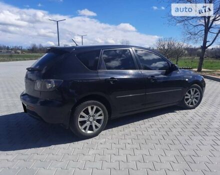 Черный Мазда 3, объемом двигателя 2 л и пробегом 222 тыс. км за 5700 $, фото 5 на Automoto.ua