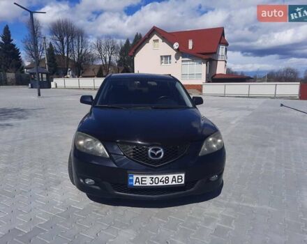Черный Мазда 3, объемом двигателя 2 л и пробегом 222 тыс. км за 5700 $, фото 1 на Automoto.ua